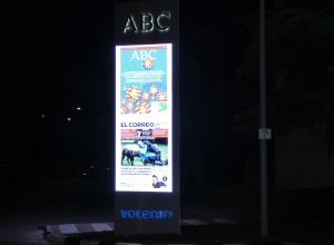 Backlit monolith with electronic screens